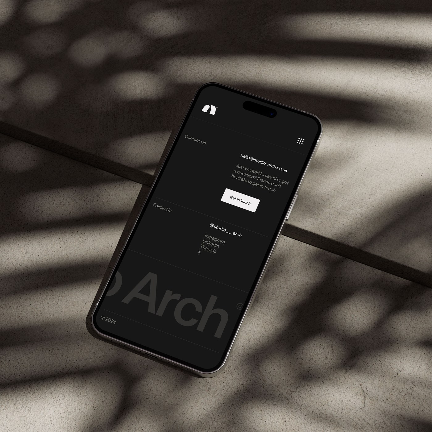 Studio Arch brand identity mobile website dark mode mockup