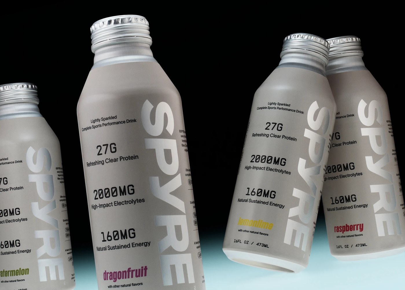 SPYRE sports drink packaging brand identity design — compressed geometric sans wordmark on cylindrical surface