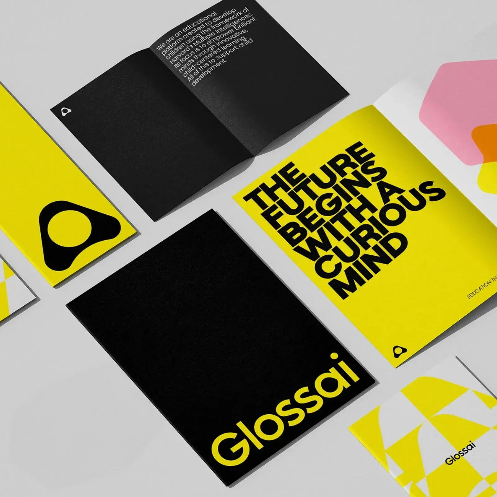 Glossai: Children's Branding Built on Sharp Yellow and Bold Type