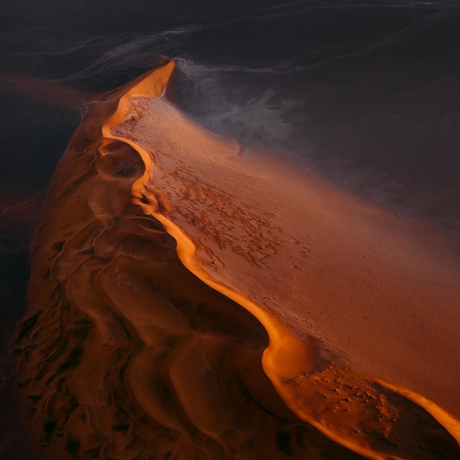 Wandering the fiery mountains of sand dunes in the Namib Desert