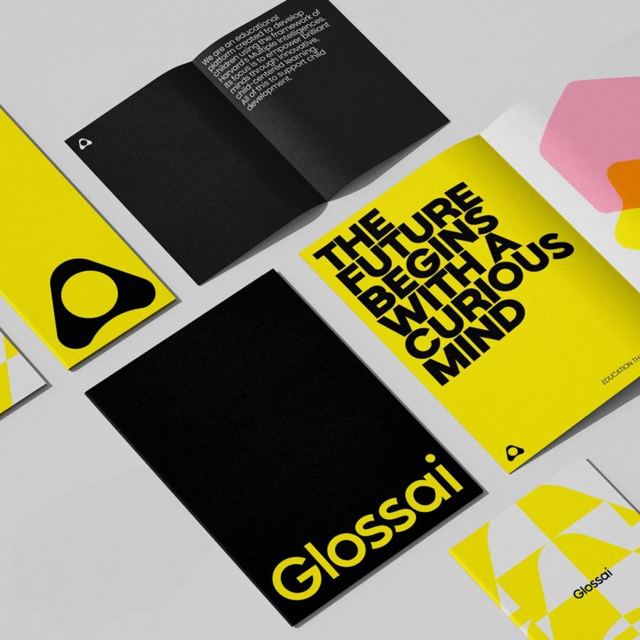 Glossai: Children's Branding Built on Sharp Yellow and Bold Type